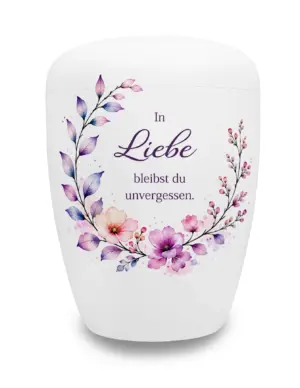 Weiße Urne mit Spruch und lila Blumen